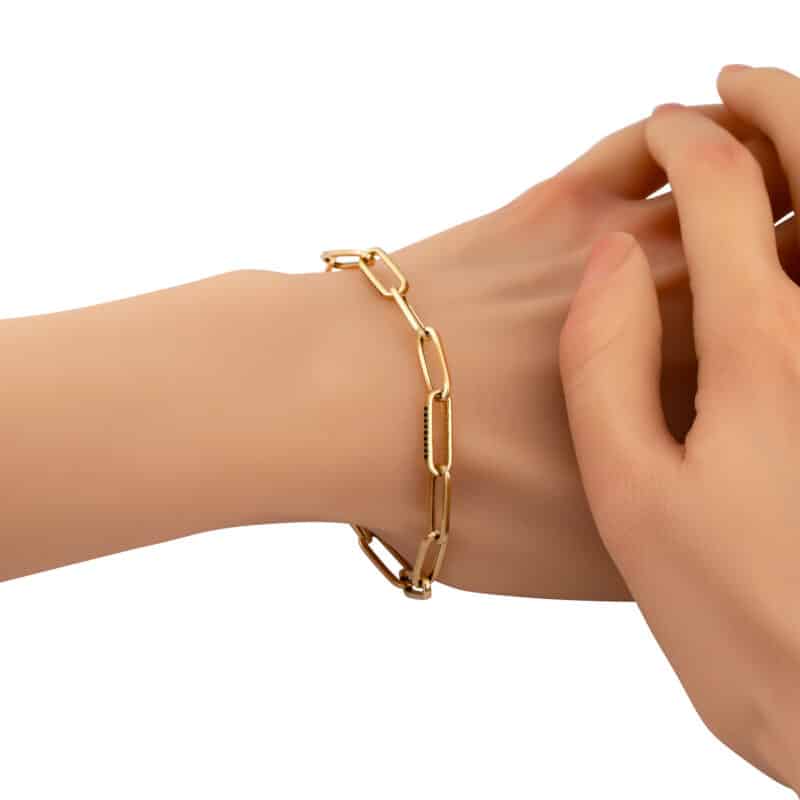 Bransoletka z żółtego złota z podłużnymi ogniwkami i czarnymi cyrkoniami 77117