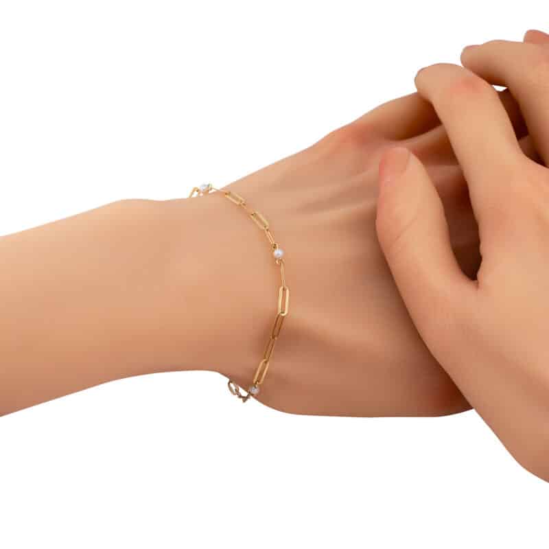 Bransoletka z żółtego złota elementowa z ogniw z perełkami 84067