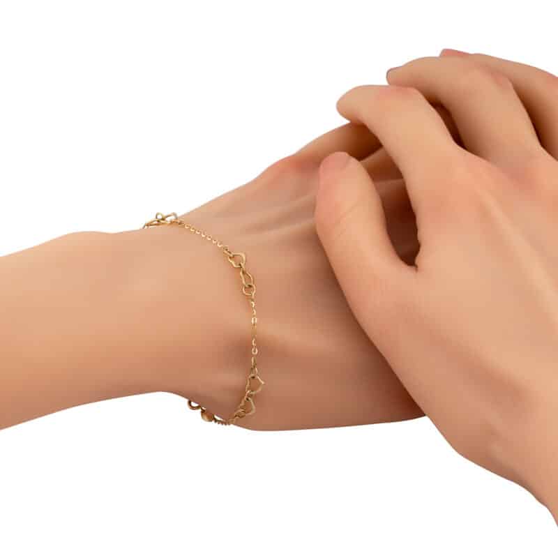 Bransoletka z żółtego złota z serduszkami 84071