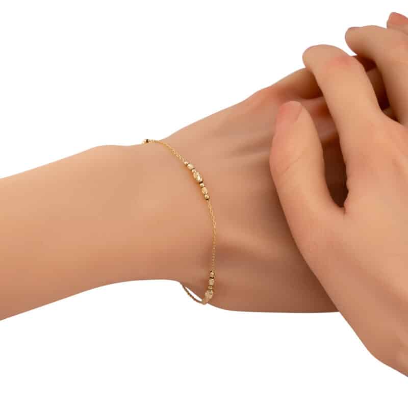 Bransoletka z żółtego złota z grawerowanymi elementami 84100