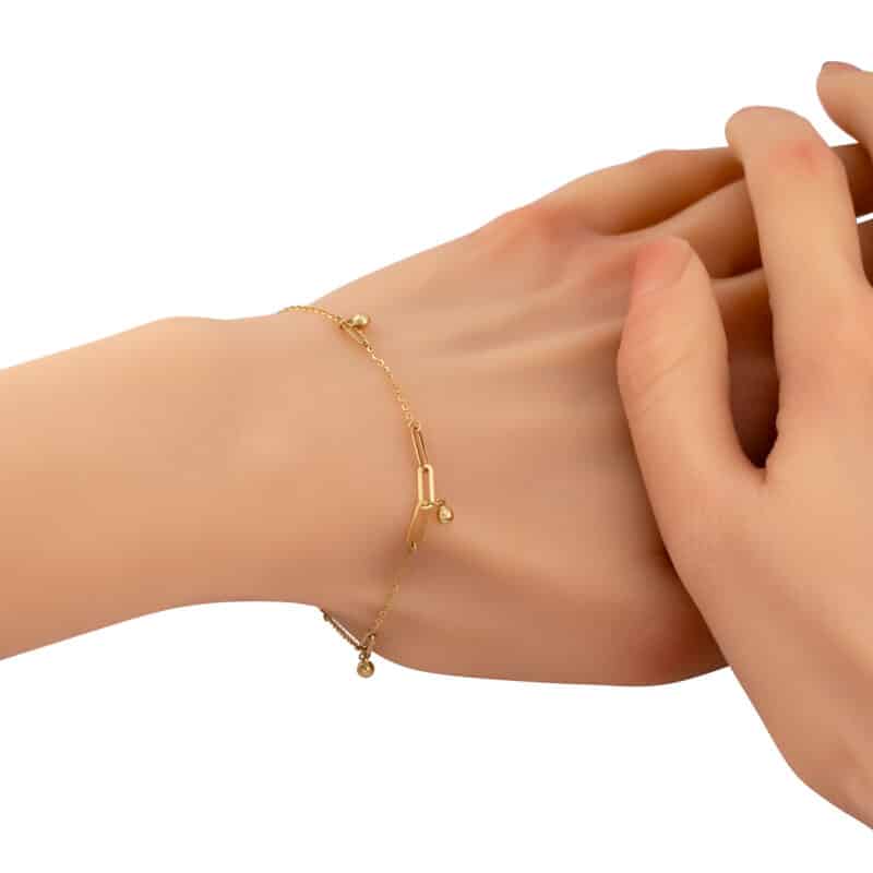 Bransoletka z żółtego złota z wiszącymi kuleczkami 84104