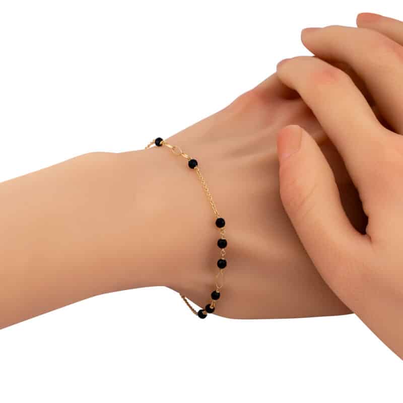 Bransoletka z żółtego złota z czarnymi cyrkoniami z kolekcji DALL’ACQUA 84196