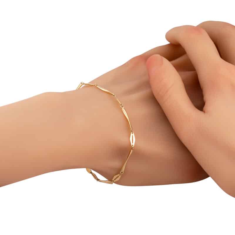 Bransoletka z żółtego złota z gładkimi elementami 84354