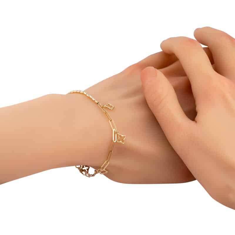 Bransoletka z żółtego złota z dwoma splotami łańcuszka i wiszącymi marokańskimi koniczynkami 84358