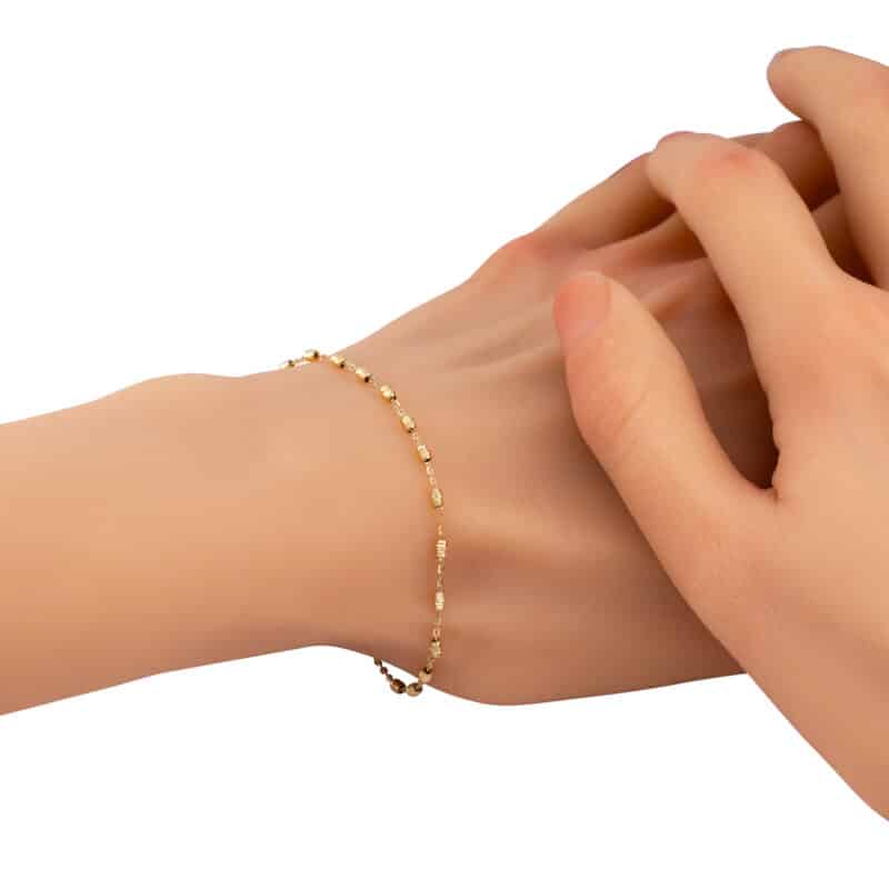 Złota bransoletka z diamentowanymi podłużnymi elementami 85216