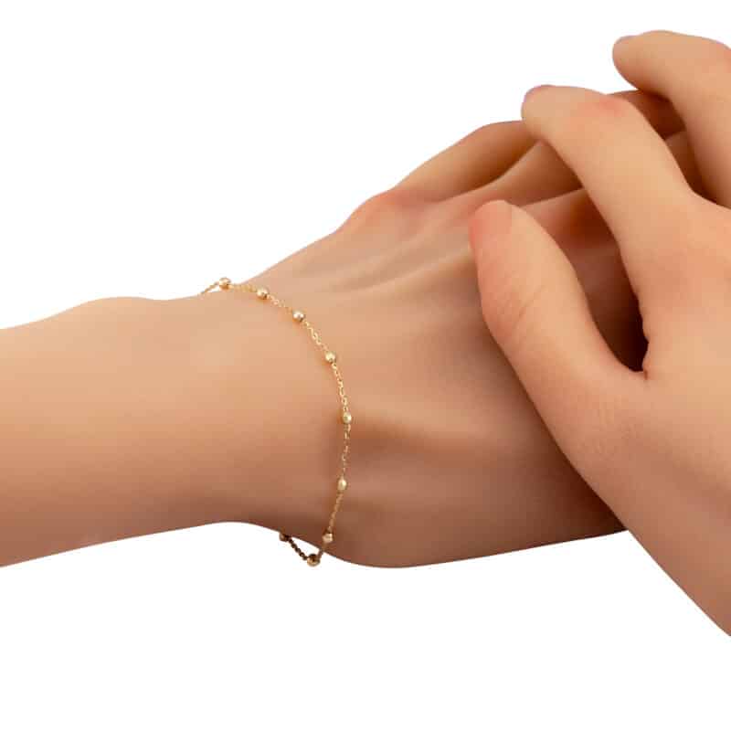 Bransoletka z żółtego złota z diamentowanymi kulkami 85217