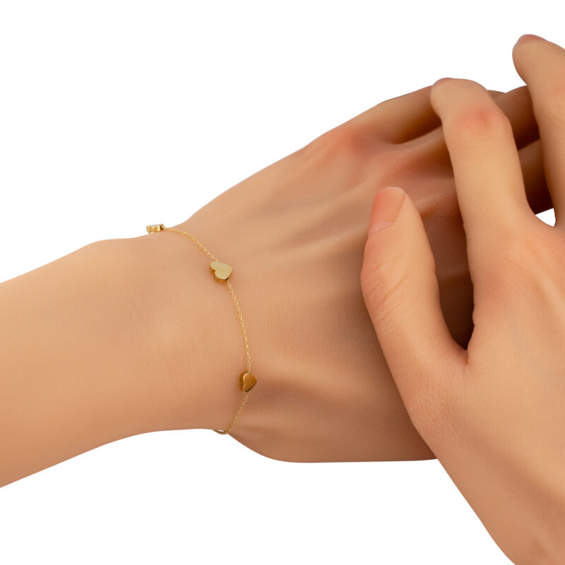 Złota bransoletka z trzema sercami - 79908