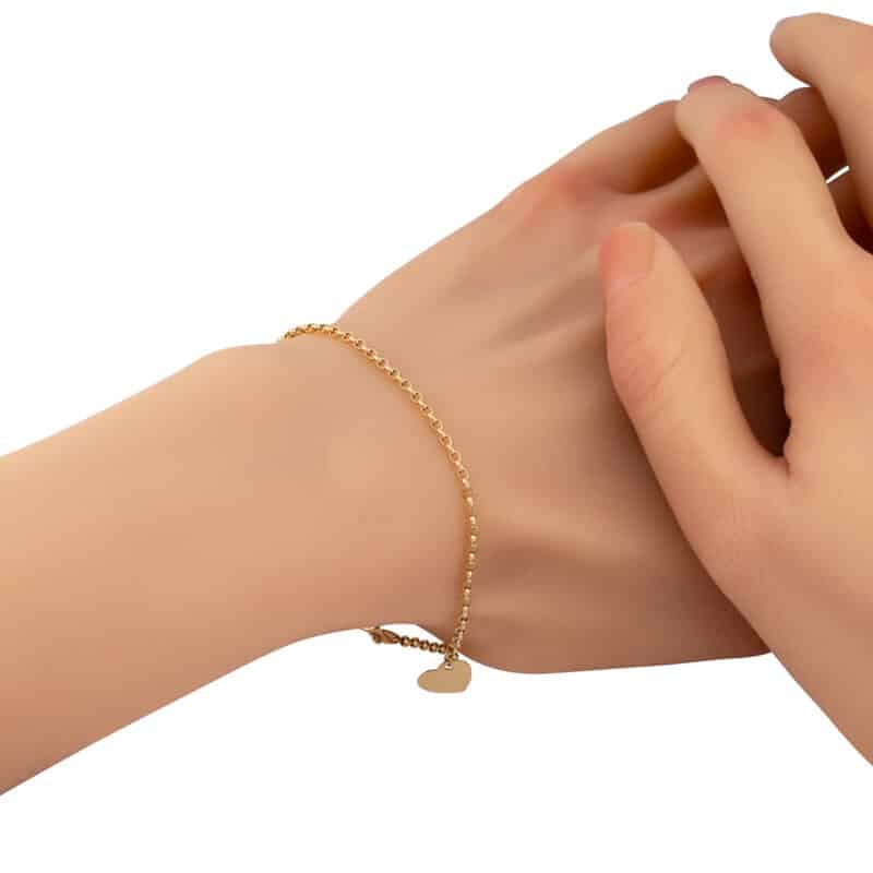 Złota bransoletka splot Rolo z zawieszką w kształcie serca 85130